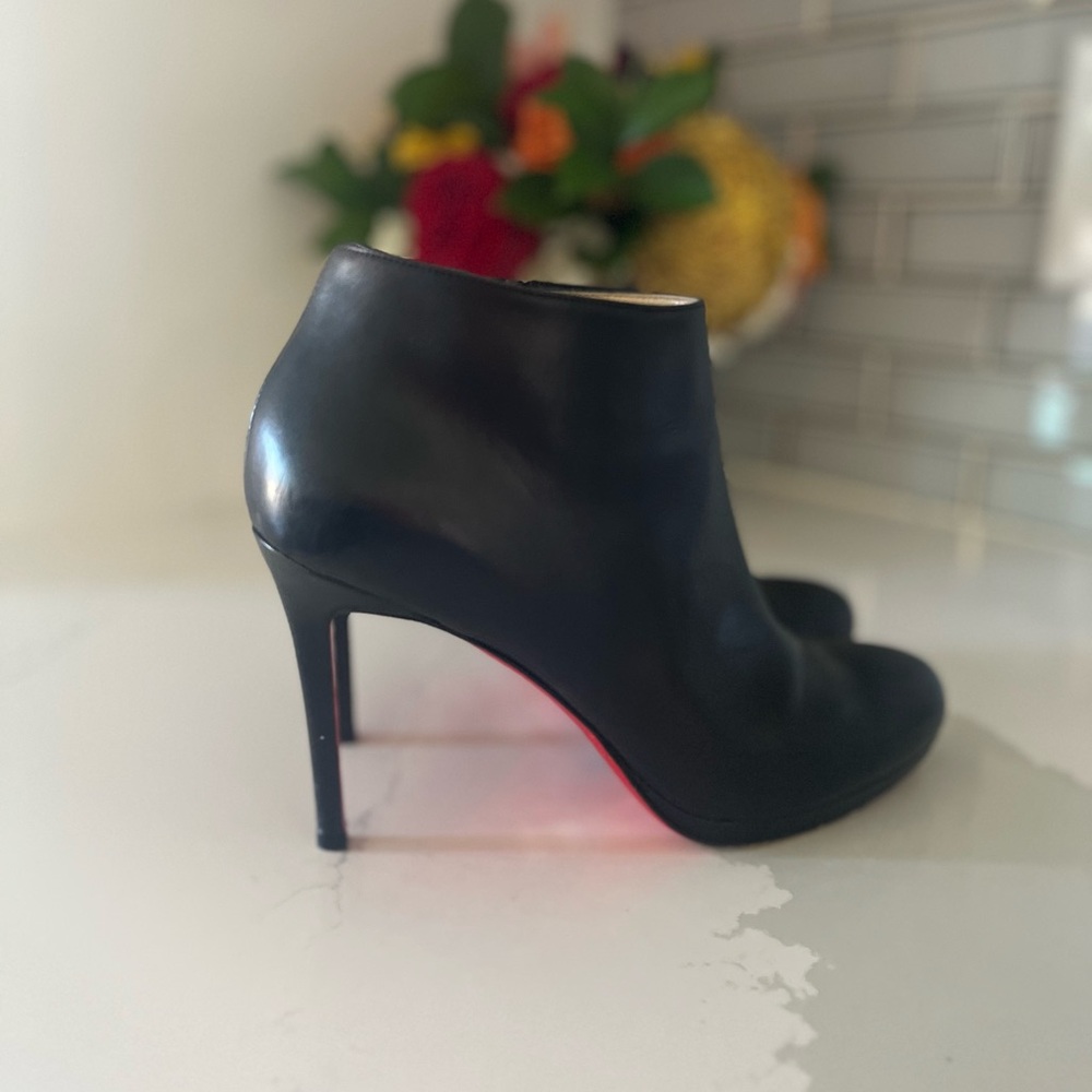 CHRISTIAN LOUBOUTIN
Belle Leather Red-Sole Ankle Boots